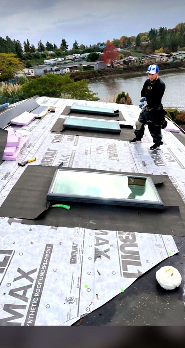 Roof replacement with synthetic underlayment and skylights in Portland, OR