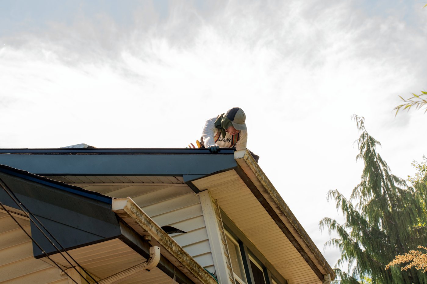Liberty roofer working on a roofline in the Portland, OR area